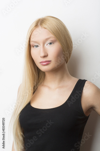 Beautiful blonde woman in black tank top