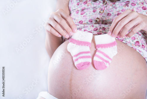 Wallpaper Mural close up litle socks for Baby on Mather billy , pregnant women Torontodigital.ca