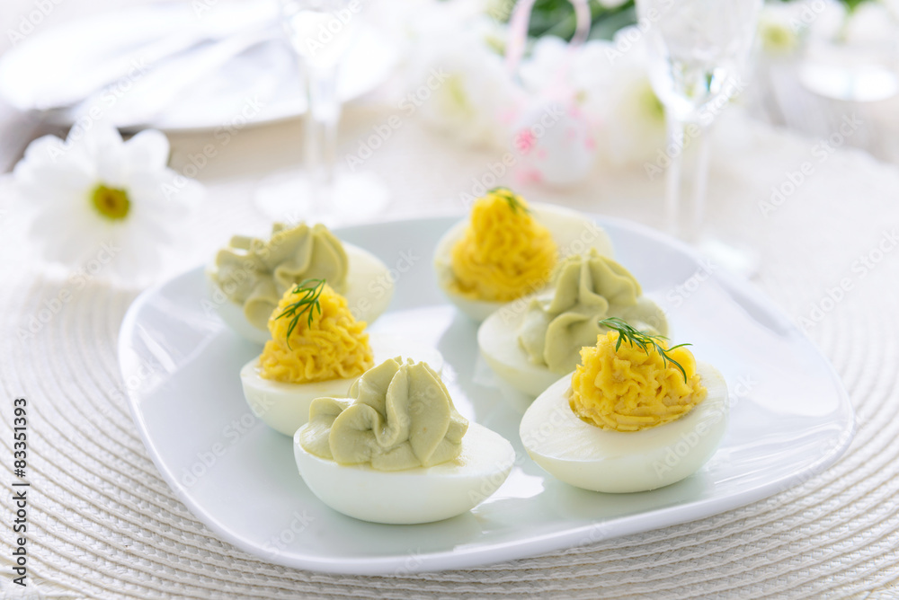 Eggs stuffed with cheese and avocado mousse Eggs stuffed with cheese and avocado mousse