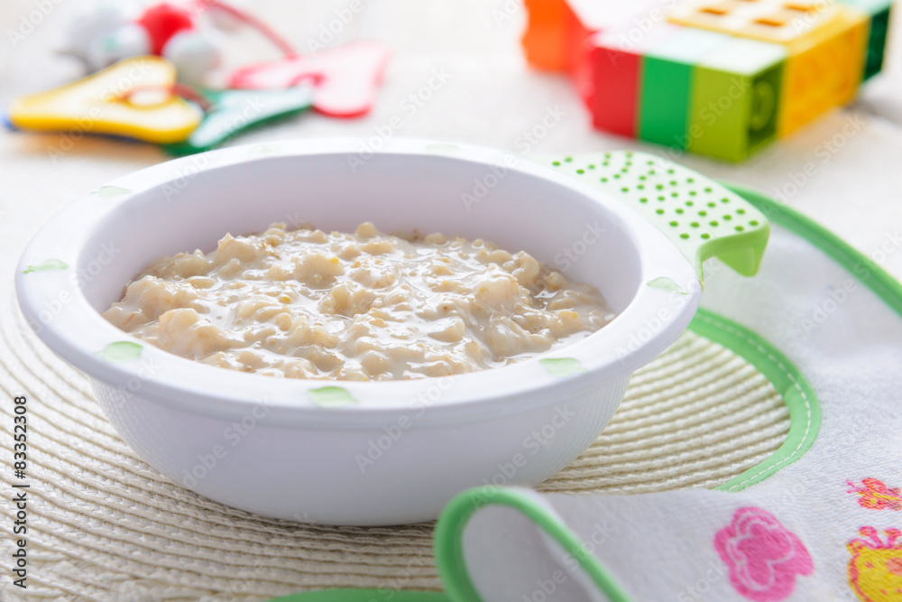 Child`s healthy food: oatmeal porridge Child`s healthy food: oatmeal porridge