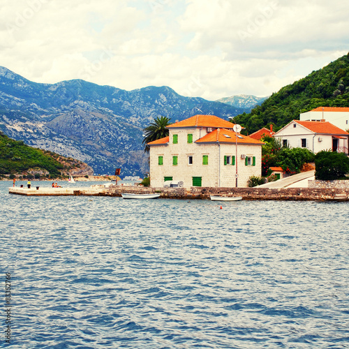 Old fishing village with pier , Kotor Bay, Montenegro. © Inna Felker