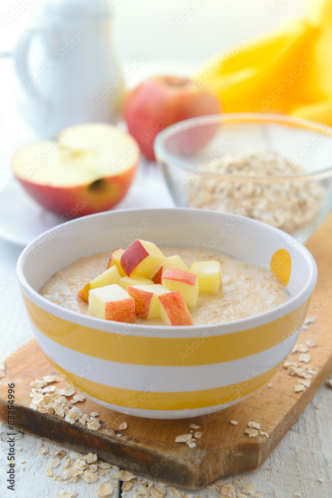 Oatmeal porridge with slice of apples Oatmeal porridge with slice of apples