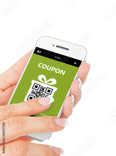 hand holding mobile phone with discount coupon over white