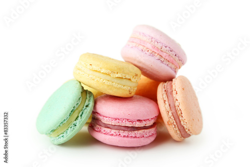 French colorful macarons isolated on white
