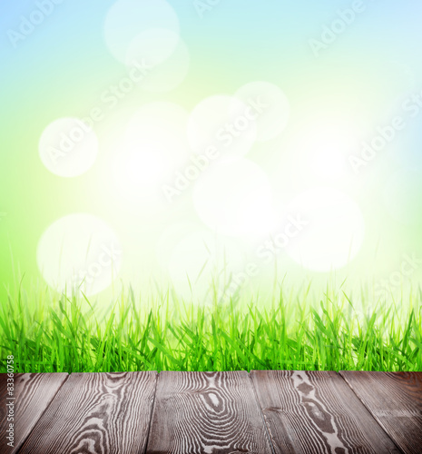 Summer background with floor, grass and bokeh