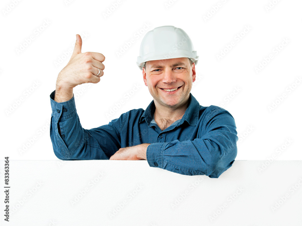 a man in a construction helmet shows gesture OK a man in a construction helmet shows gesture OK