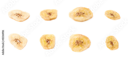 Multiple dried banana slices snacks isolated