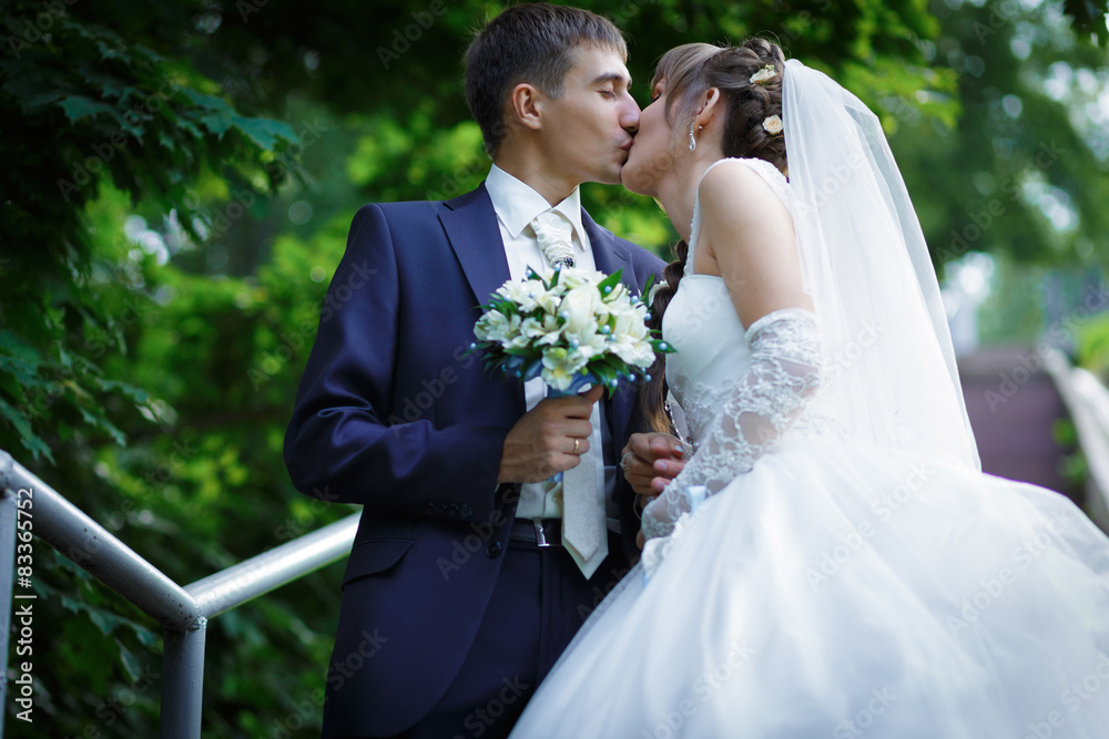Bride and groom are kissing Bride and groom are kissing