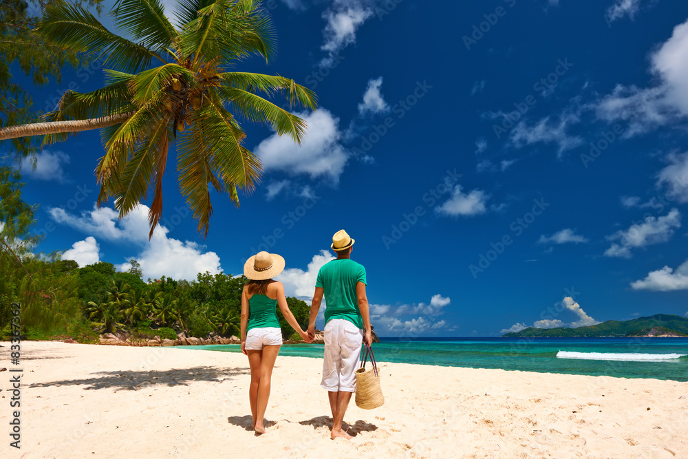 Couple on a beach at Seychelles Couple on a beach at Seychelles