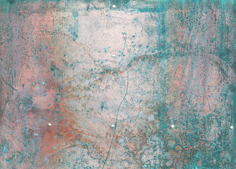 scratched and rusty green metal surface