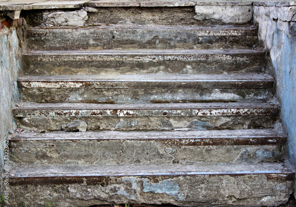 Old concrete staircase destroyed rough grass on the steps Old concrete staircase destroyed rough grass on the steps