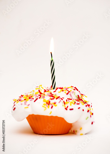 Cupcake with a lit candle