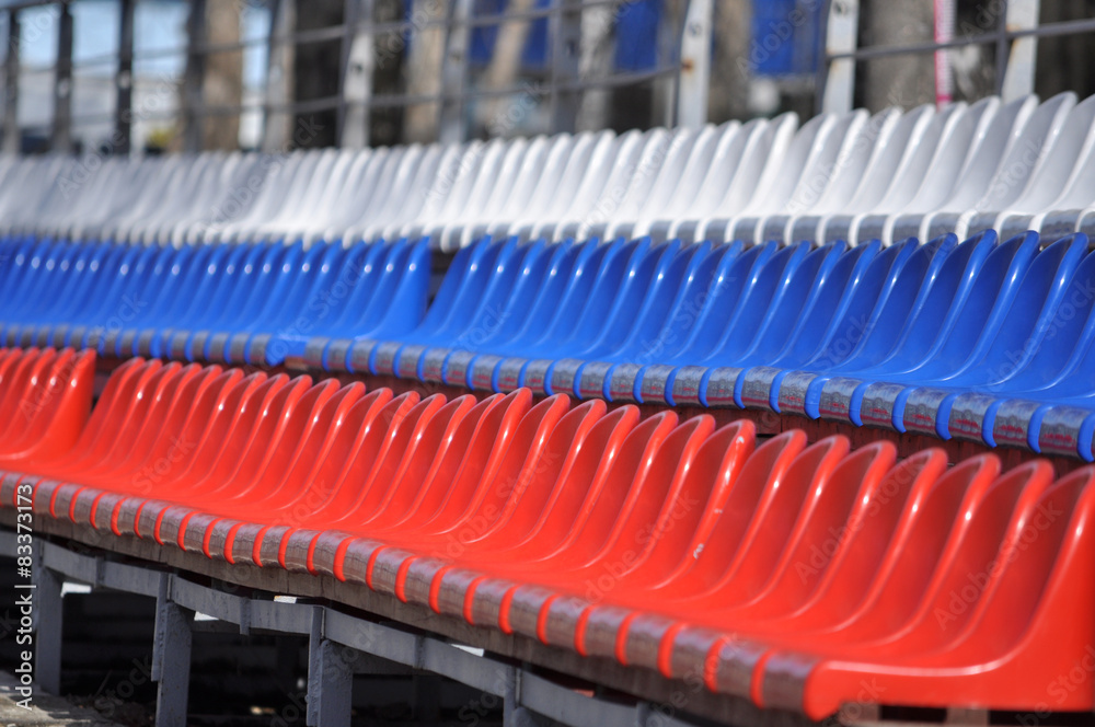 Fototapeta premium Plastic seats in the stadium.