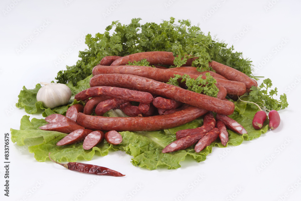 Composition of the smoked sausages and vegetables. Composition of the smoked sausages and vegetables.