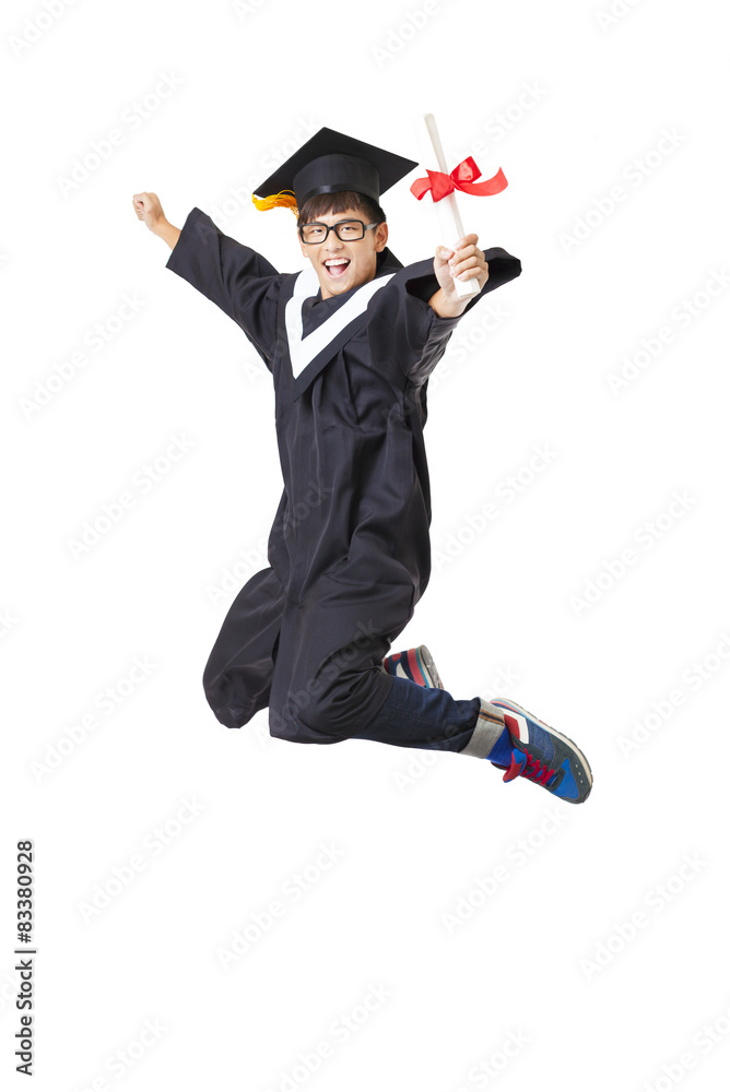 Happy  student in graduate robe jumping against white background