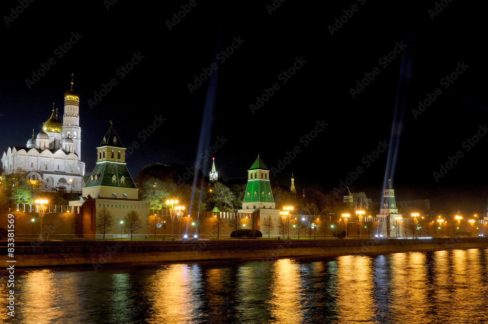 Festive illumination of the Moscow Kremlin at night.