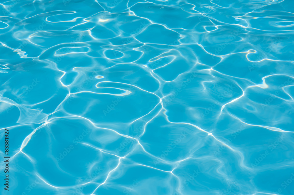 Bright water surface in swimming pool Bright water surface in swimming pool