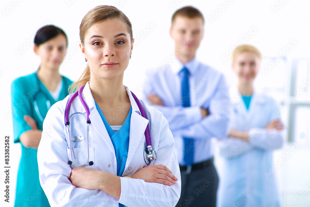 Woman doctor standing with stethoscope at hospital