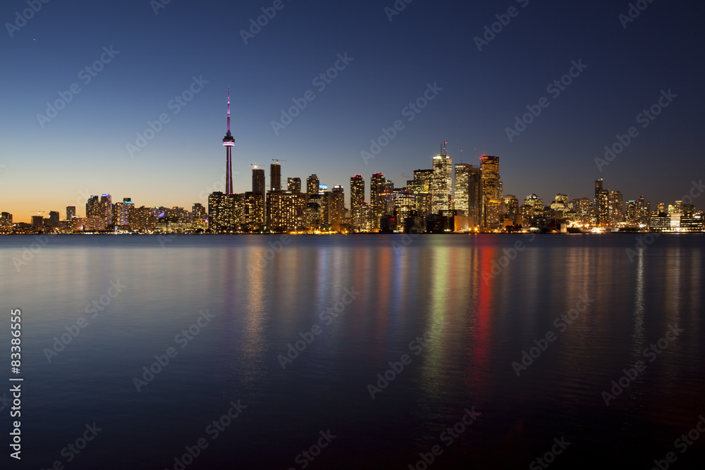 toronto skyline and harbor at dusk