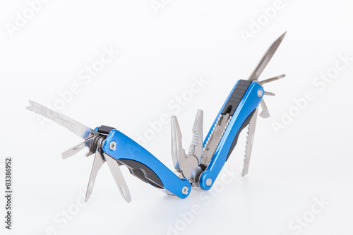 Steel multitool isolated on white background