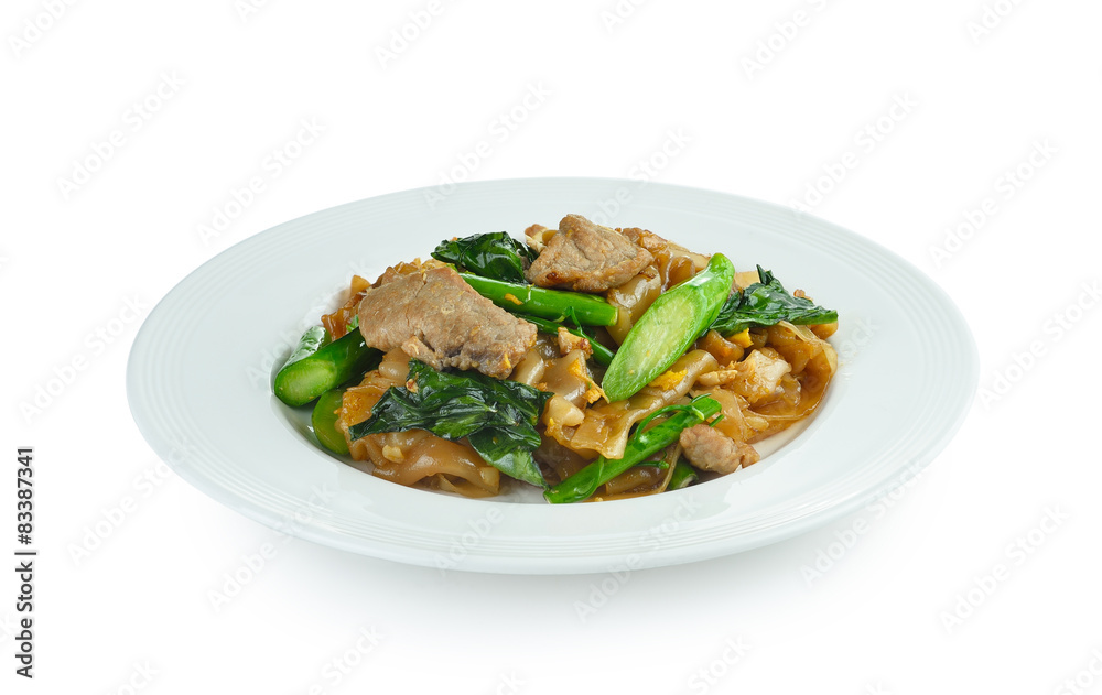 Stir-fried Noodles with pork and  chinese broccoli  on white bac