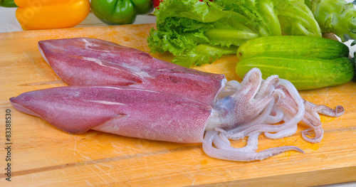 fresh squid on wood board