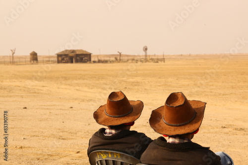 Twins with Hat at rural area Desert
