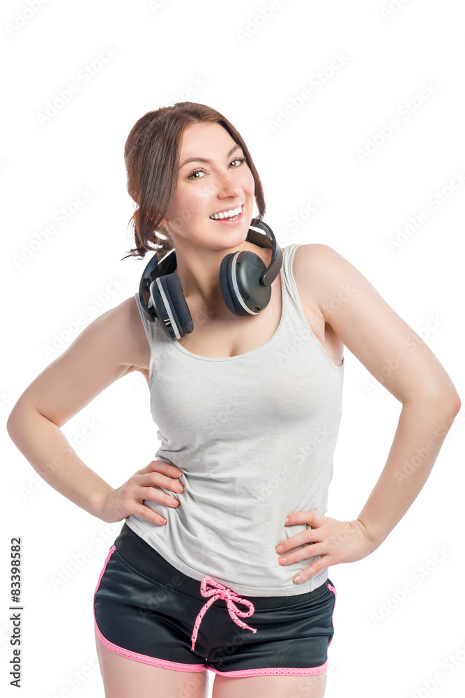 happy woman athlete with headphones on white background happy woman athlete with headphones on white background