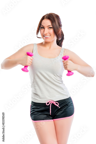trainer exercising with dumbbells in studio © kosmos111
