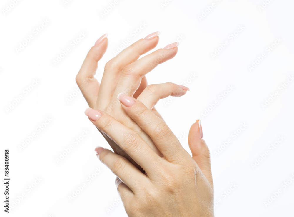 Woman rubs hand cream, makes a hand massage Woman rubs hand cream, makes a hand massage