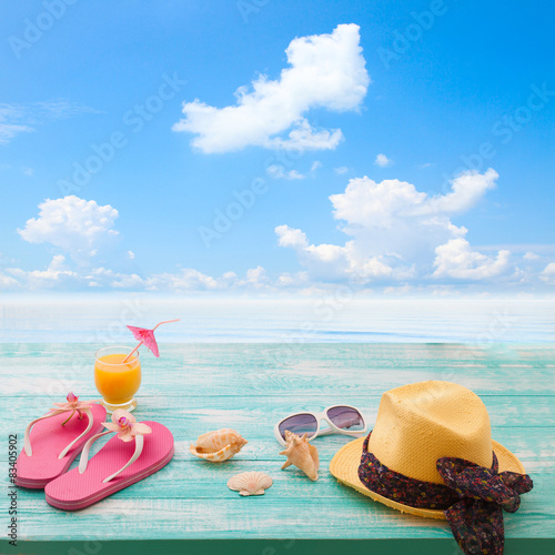 Summer Holidays. Beachwear on wooden background. 
