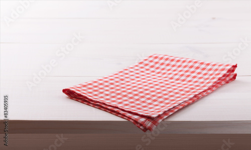 Tablecloth textile on white wooden background 