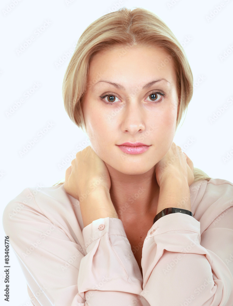 Young beautiful woman holding hands on her neck Young beautiful woman holding hands on her neck