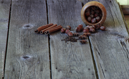 Wood nut, asterisks of an anise, a stick of cinnamon and a carna photo