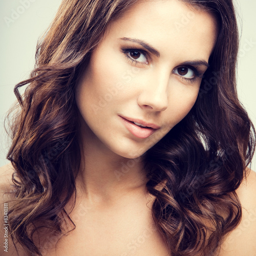 Portrait of beautiful young brunette woman