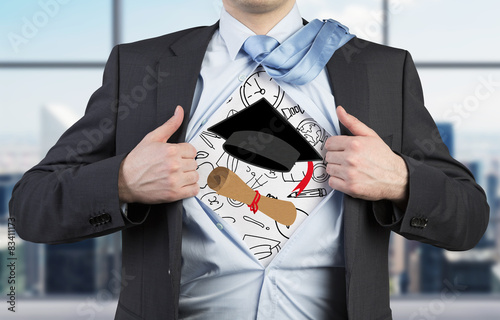 Young student is tearing the shirt. 