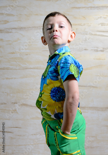 Boy Wearing Floral Print Shirt with Hands on Hips