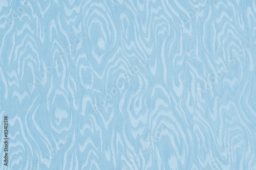 Light blue silk damask fabric with moire pattern photo