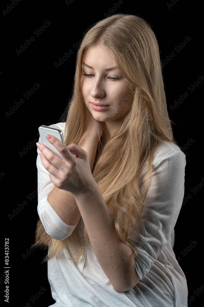Pretty girl enjoying chat over internet on her personal cellular phone Pretty girl enjoying chat over internet on her personal cellular phone