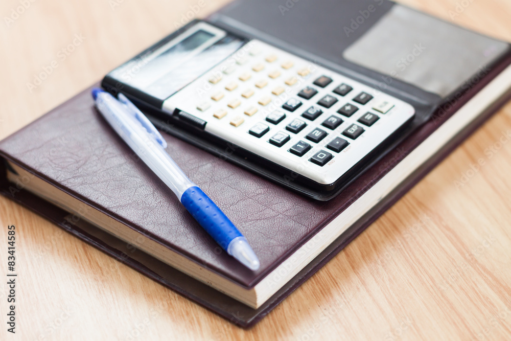 Classic leather notebook with pen and calculator Classic leather notebook with pen and calculator