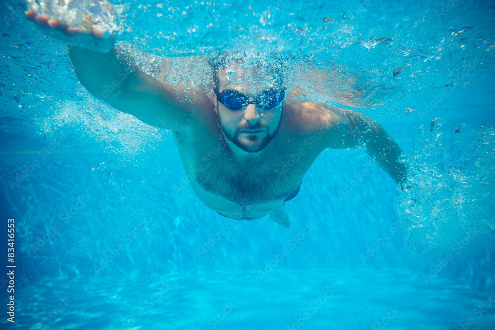 Underwater portrait of young man