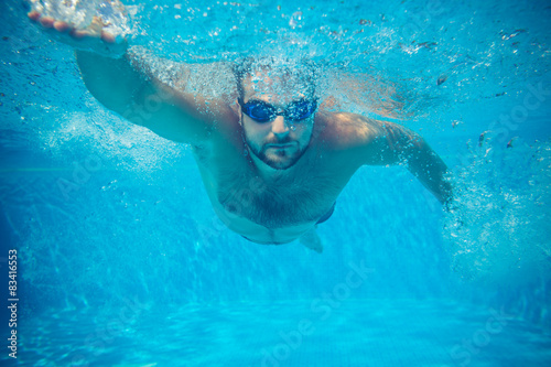 Underwater portrait of young man © Sunny studio
