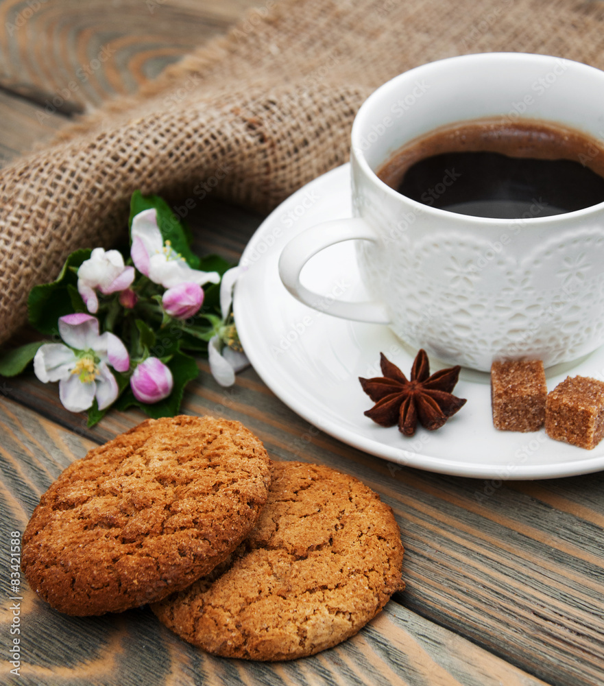 Cup of coffee and oatmeal cookies