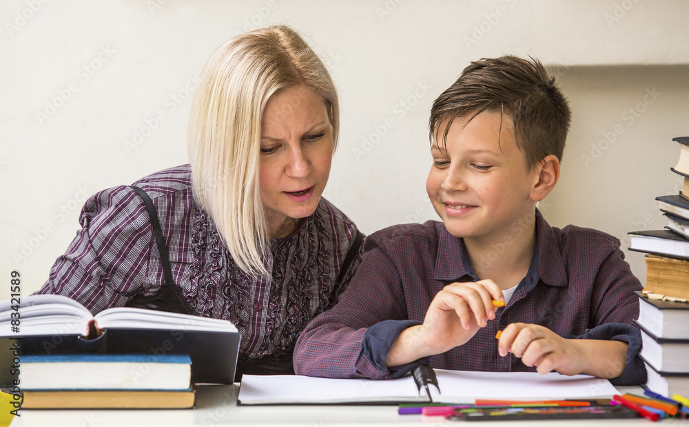 Preschooler engaged lessons with tutor.. Preschooler engaged lessons with tutor..