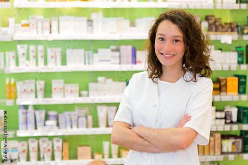 Portrait of an attractive pharmacist at work