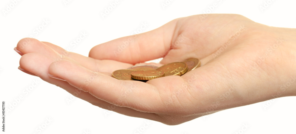 Female hand with coins isolated on white Female hand with coins isolated on white