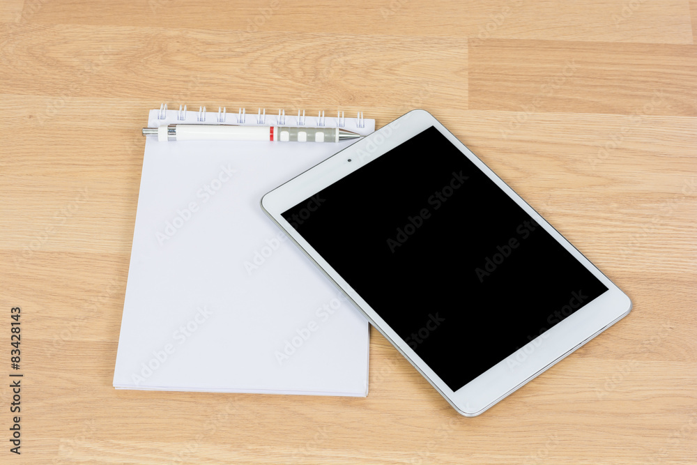 White digital Tablet on wooden White digital Tablet on wooden
