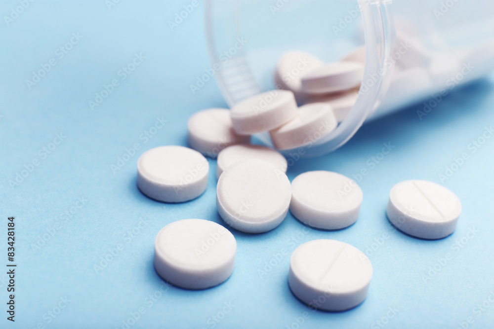Heap of pills on color background Heap of pills on color background