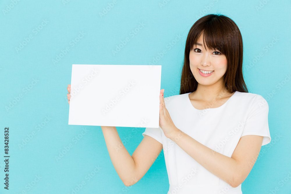 attractive asian nurse on blue background attractive asian nurse on blue background