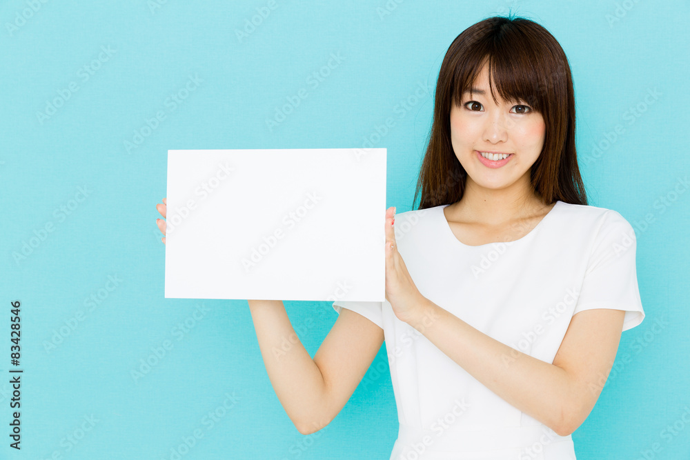 attractive asian nurse on blue background attractive asian nurse on blue background